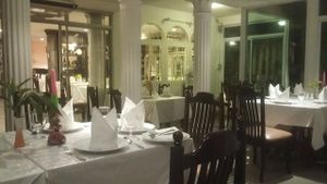 White cloth dining at The Vegetarian Cottage in Bangkok