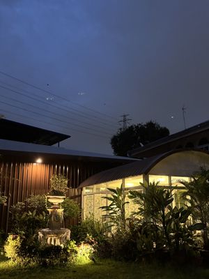 Garden at night  at The Vegetarian Cottage in Bangkok