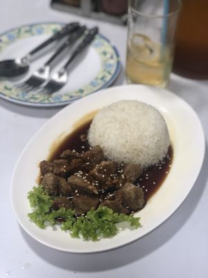 Vegan fried pork in black soy sauce with rice at Ruyi Vegetarian in Bangkok