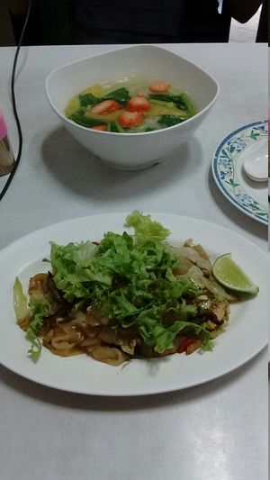 Fried noodles and wonton noodle soup. 50 baht each. at Ruyi Vegetarian in Bangkok