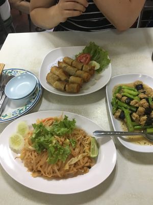 Pad thai, asparagus and tofu, and spring rolls. at Ruyi Vegetarian in Bangkok