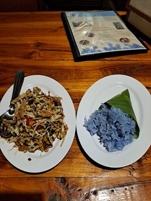 Tea leaf salad and indigo sticky rice at Aum in Chiang Mai
