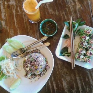 Fresh springrolls, curryrice and passionfruit-carrot juice  at Aum in Chiang Mai