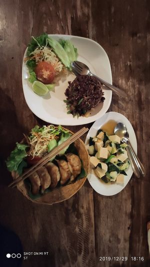 (Top) Pineapple fried rice, (Left) Gyoza, (Right) Stream ginger tofu at Aum in Chiang Mai