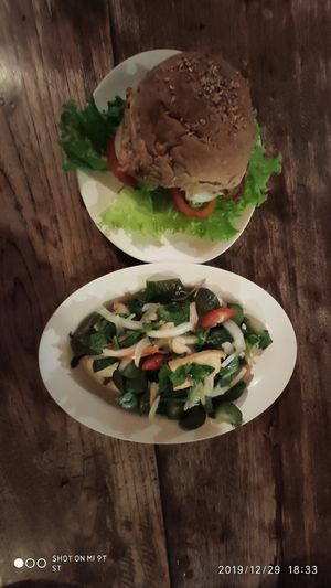 Top : Tempeh burger. Bottom : Eggplant salad at Aum in Chiang Mai