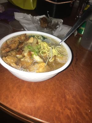 Vegan chicken yellow noodle laksa and vegan chicken drumsticks (vegan)  at Utopia Vegan in Dickson