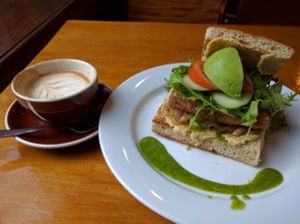 Tofu Burger & Soy flat white. at Raw Power Cafe in Auckland