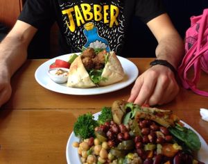 Falafel pita and salad plate (and a cool Jabber shirt) at Raw Power Cafe in Auckland