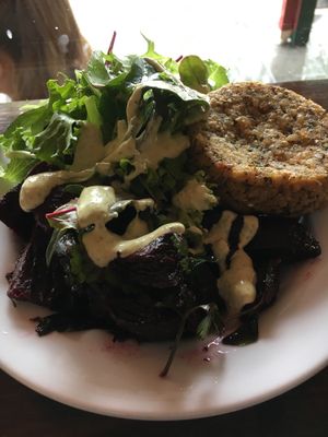 Fritter with salads at Iku Wholefood Kitchen in Glebe