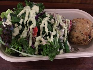 Rice ball with salad at Iku Wholefood Kitchen in Glebe