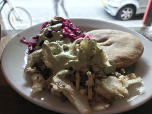 Pie & salad with tahini dressing  at Iku Wholefood Kitchen in Glebe