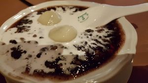 Sesame  balls with black rice sweet dessert at Mother Chu's Vegetarian Kitchen in Sydney
