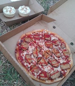 takeaway tempehroni pizza and raw key lime pies at Vegie Bar in Fitzroy