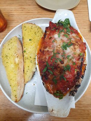 Lasagne with garlic bread $28.00 at Vegie Bar in Fitzroy