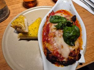 Lasagne $26.00 (price drop since last visit!): good and saucy but tangy and not much mince at all, great garlic bread at Vegie Bar in Fitzroy