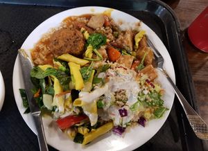 Vegan platter with kofta, tofu stew, pasta salad, quinoa salad. Not pictured: juice, and delicious sticky date pudding! at Gopals in Melbourne