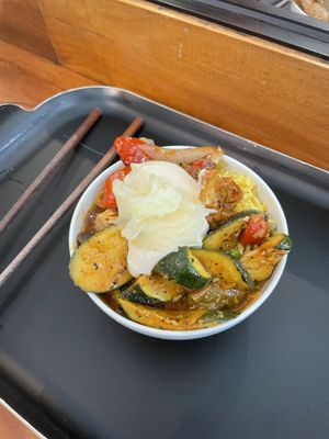 Lots of curries and veggies and tofu dip on top!  at Tofulicious in Richmond