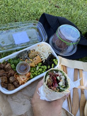 My little picnic with a half falafel wrap, tempeh bowl and choc beetroot brownie. at Manna Wholefoods Cafe in South Fremantle