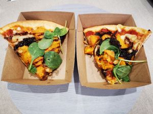 Pumpkin, caramelised onion, spinach and vegan mozzarella pizza at Manna Wholefoods Cafe in South Fremantle
