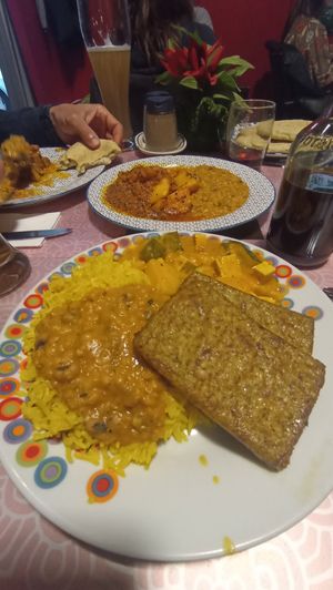 Onion tofu with basmati rice, beans, potatoes and zucchini with curry sauce at Bio Bistro Spicy Spices in Salzburg