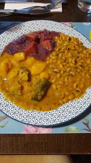 mixed vegetables and beans served with naan at Bio Bistro Spicy Spices in Salzburg