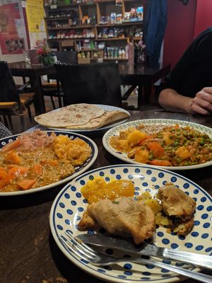 Seitan curry and Dahl with chapatti and nan bread.  at Bio Bistro Spicy Spices in Salzburg