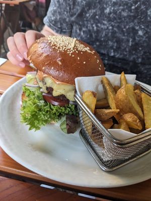 Vegan burger with fries at Hollerei in Vienna