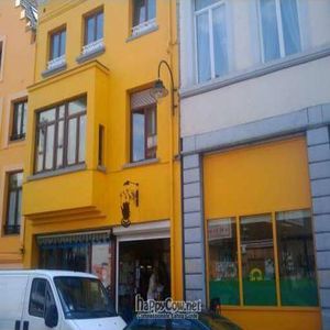 You can't miss the vibrant yellow building that holds Den Teepot and the organic shop beneath it.  at Den Teepot in Brussels