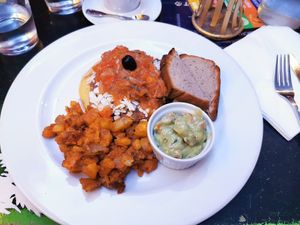 HUEVOS RANCHEROS -
corn tortilla with beans, mixed tofu,
salsa and guacamole. at Radost FX Cafe in Prague