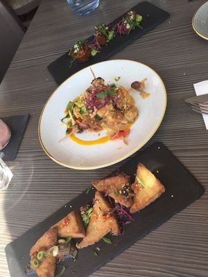 Starters - mushroom scallops, satay skewers and crispy tofu  at Food For Friends in Brighton