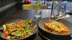 Half eaten gnocci & side salad  at Food For Friends in Brighton