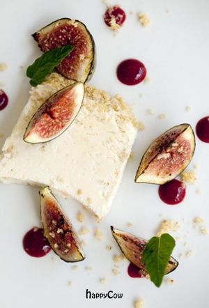 Hazelnut and nougat glace with roasted plums and a berry comp'te (gf,n) at Food For Friends in Brighton