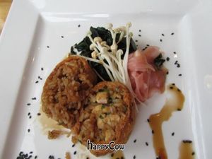 Tofu pockets stuffed with rice, served with seaweed and enoki mushrooms, soy sauce, pickled ginger at Food For Friends in Brighton