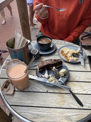 Our food (excuse the hacked up cake!)  at Wai Kika Moo Kau in Brighton