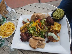 Platter for two with chips and guacamole on the side at Wai Kika Moo Kau in Brighton