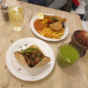 Quack wrap with mini English breakfast, all with gluten free options and the green smoothie at Wai Kika Moo Kau in Brighton