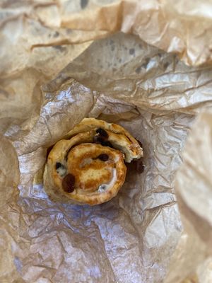 partially eaten chelsea bun in the bag, sorry!   at Infinity Foods in Brighton