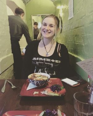 me at the rainbow cafe with my vegetarian lasagne at Rainbow Vegetarian Cafe in Cambridge
