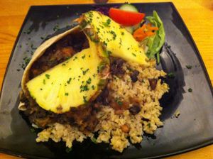 Jamaican Roti Cups -
Fresh banana, rosecoco beans, black turtle beans, coconut milk, Jamaican spices, roasted sweet
potato and more, served in a chapatti cup with traditional rice’n’peas.  at Rainbow Vegetarian Cafe in Cambridge