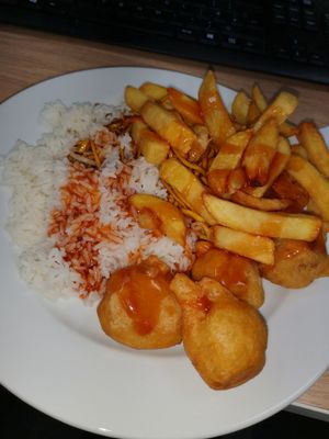 Vegan chicken balls, chicken chow mein, chips and boiled rice. at Veggie World in Milton Keynes