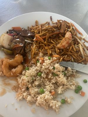 Takeaway of Sweet and sour prawns, young chow mien, beef in black bean sauce and chicken fried rice. at Veggie World in Milton Keynes