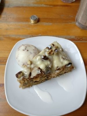 Carrot & walnut cake with vegan caramel cookie ice cream, served warm :) at Alley Cafe Bar in Nottingham