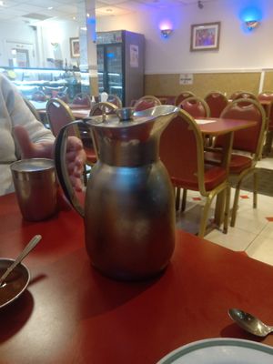 Jug of lassi at Sardaar Restaurant in Leicester