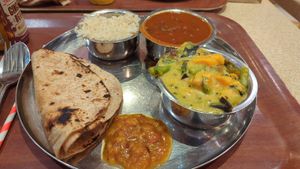 Bean pot, veg curry, Chapati and rice about £12 at Govinda's in London