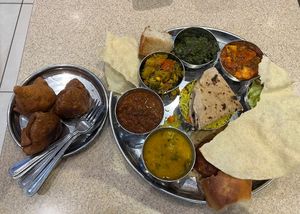 Thali extravarganza and  samosa (not fully vegan, I shared it with a non-vegan)  at Govinda's in London