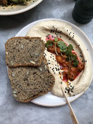 This hummus was SO DELICIOUS on this gluten-free bread 😘  at Mildreds - Soho in London