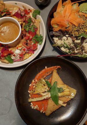 Chipotle Cheez Nachos / Alma Bowl / Roman Artichokes at Mildreds - Soho in London
