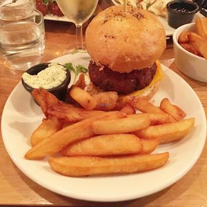 classic smoked tofu burger w/ vegan cheese. yum! at Mildreds - Soho in London