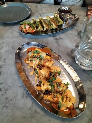 Gyozas and corn ribs. Sauce was especially good! at Mildreds - Soho in London