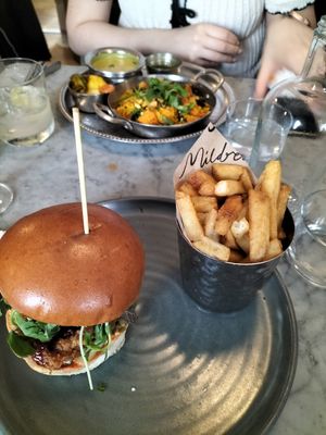 Kimchi Korean style burger with lemon pepper fries at Mildreds - Soho in London